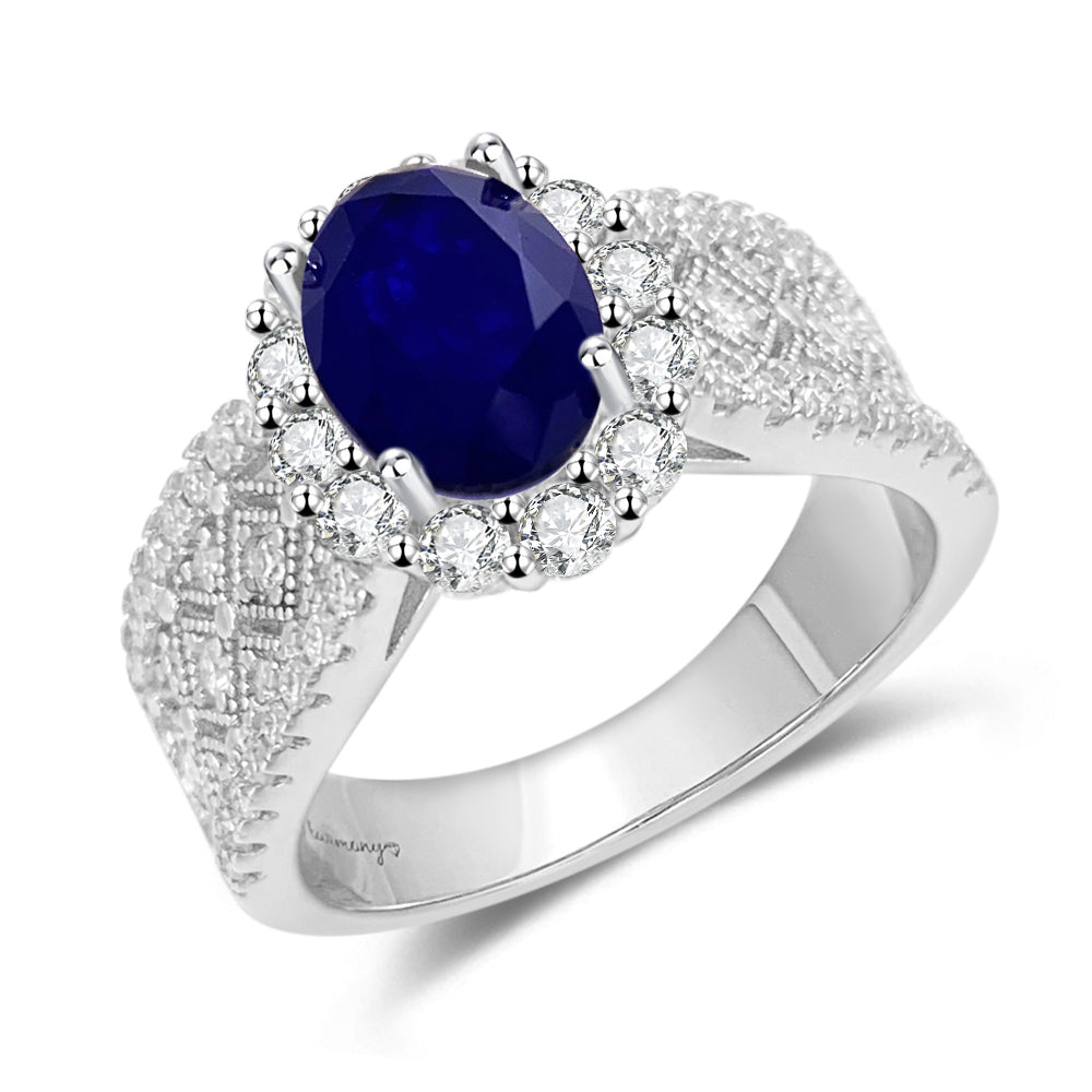 Entourage ring met briljanten en een saffier blauwe ovaal geslepen edelsteen