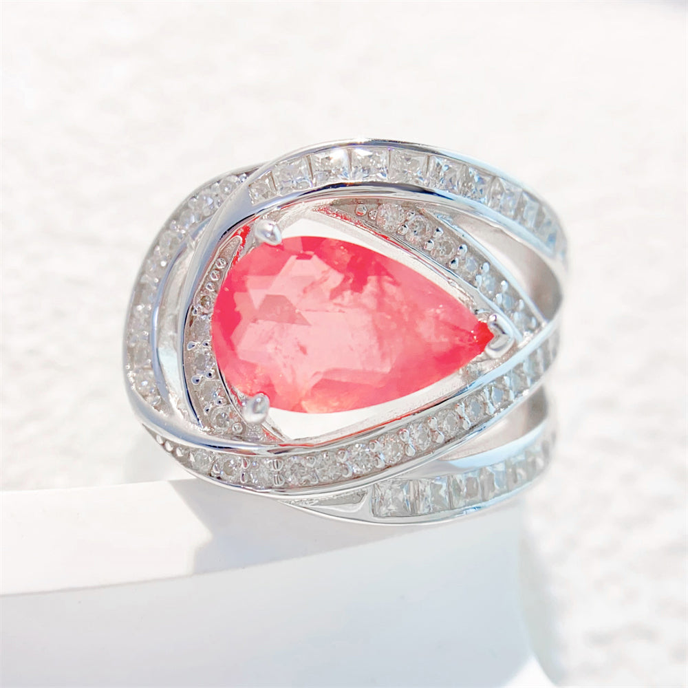 Design ring met briljanten, prinsessen en een roze peer vorm briljant