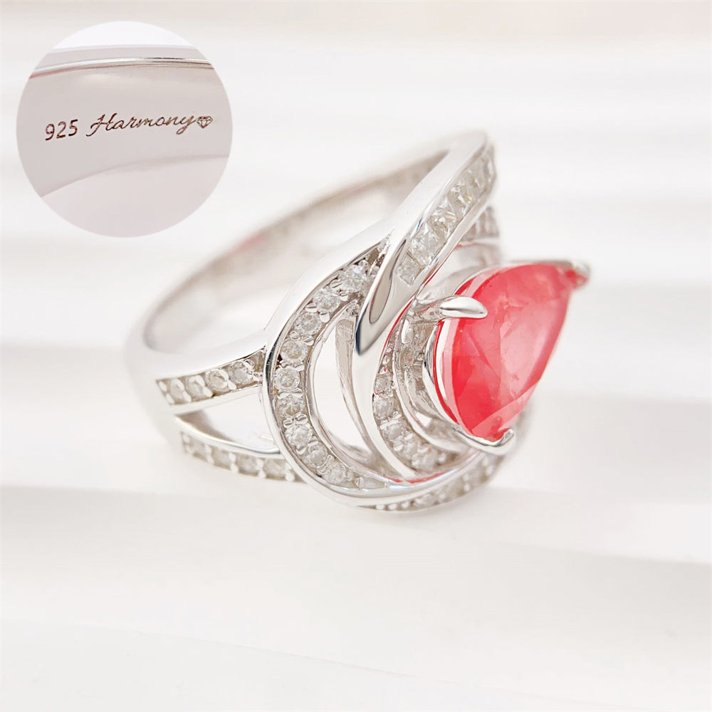 Design ring met briljanten, prinsessen en een roze peer vorm briljant