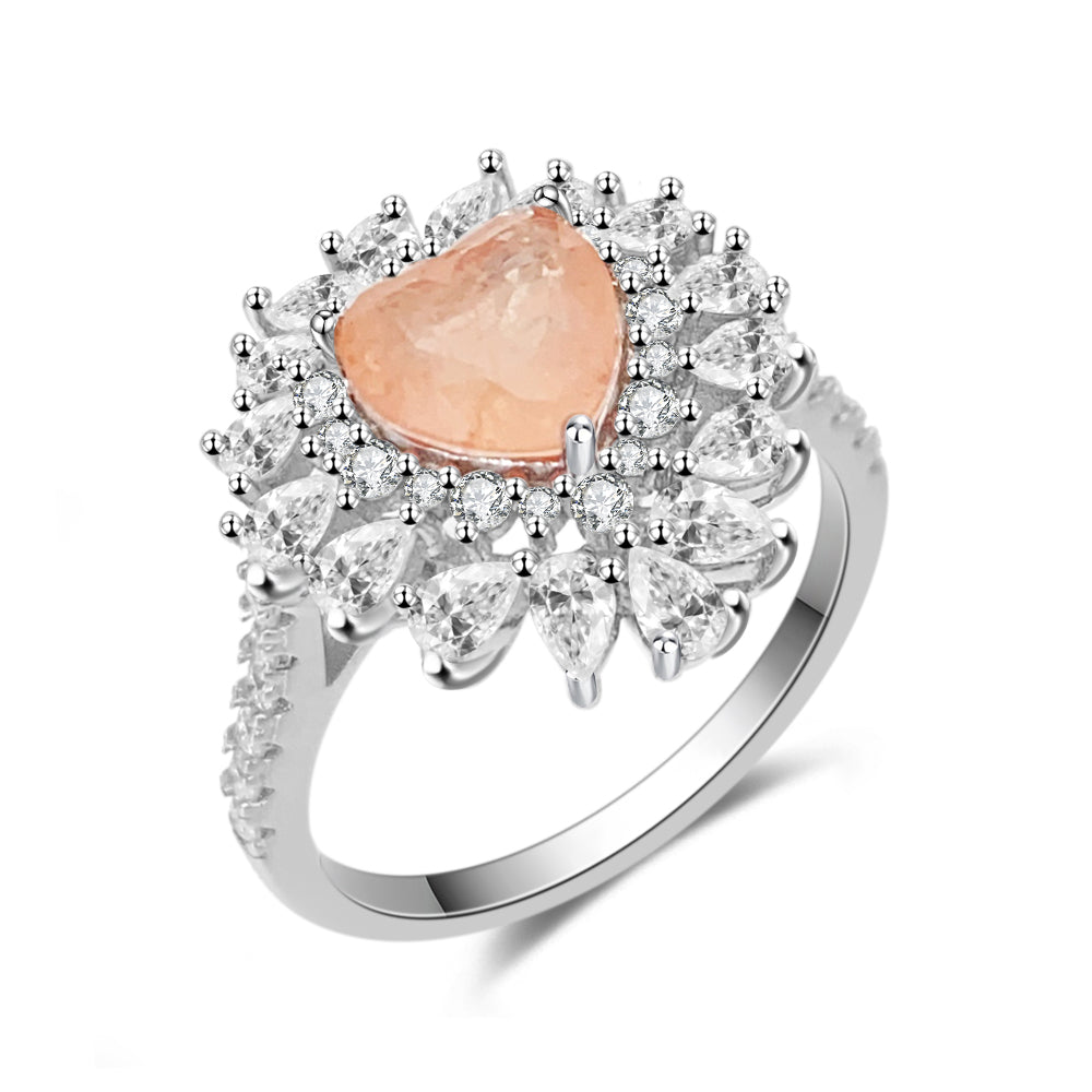 Entourage ring met een roze hart vorm, kleine briljanten, marquizen en peer vorm briljanten