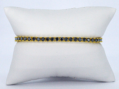 Gele tennisarmband met zwarte briljanten