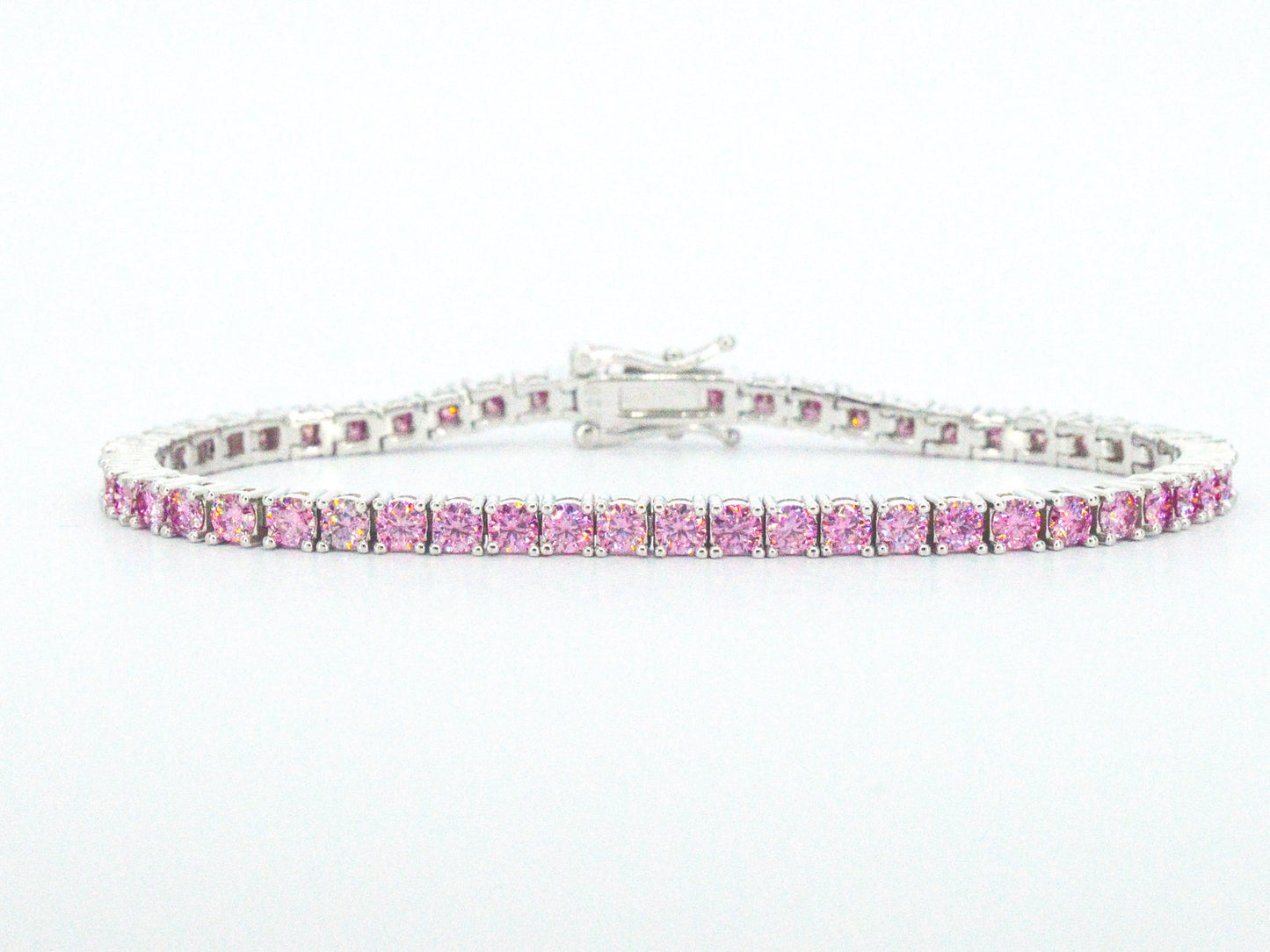 Witte tennisarmband met roze briljanten