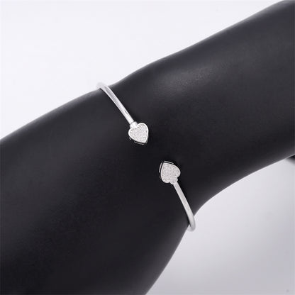 Armband met een hart vorm aan beide uiteinden