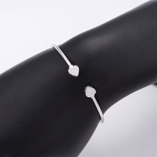 Armband met een hart vorm aan beide uiteinden