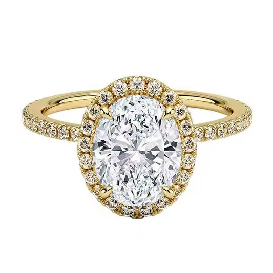 Gele entourage ring met een grote ovaal geslepen briljant