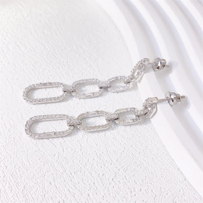 Hangende oorbellen met chain links en witte briljanten