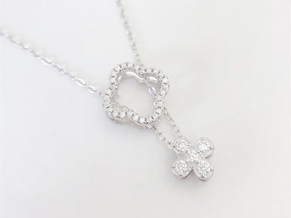 Witte ketting met klaver ketting gezet met briljanten