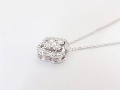 Witte ketting met klaver ketting gezet met briljanten