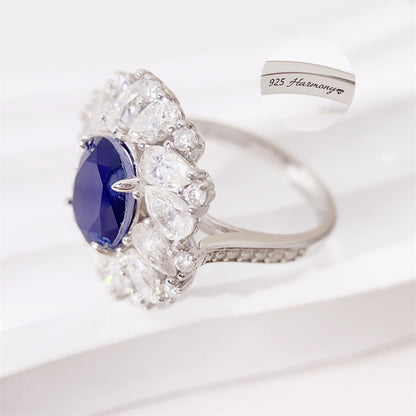 Design ring met briljanten, peer vorm briljanten en een grote saffier blauwe ovaal