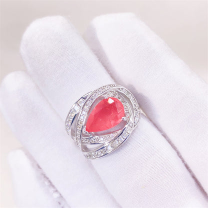 Design ring met briljanten, prinsessen en een roze peer vorm briljant