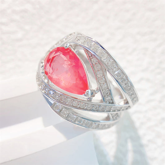 Design ring met briljanten, prinsessen en een roze peer vorm briljant