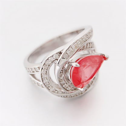 Design ring met briljanten, prinsessen en een roze peer vorm briljant