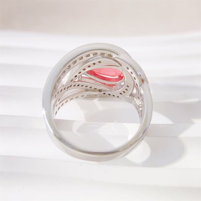 Design ring met briljanten, prinsessen en een roze peer vorm briljant