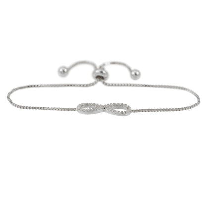 Witte armband met infinity symbool rond gezet met briljanten