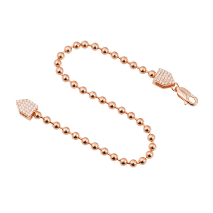 Rosékleurige ronde armband bezet met briljanten